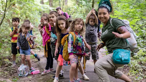 Campers exploring the forest together