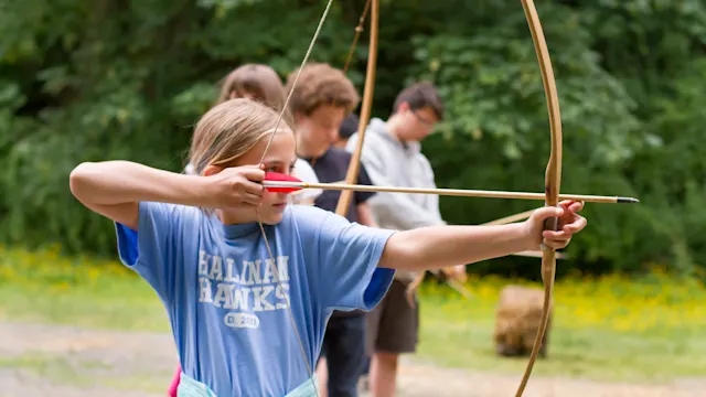 Kids at the archery range after school