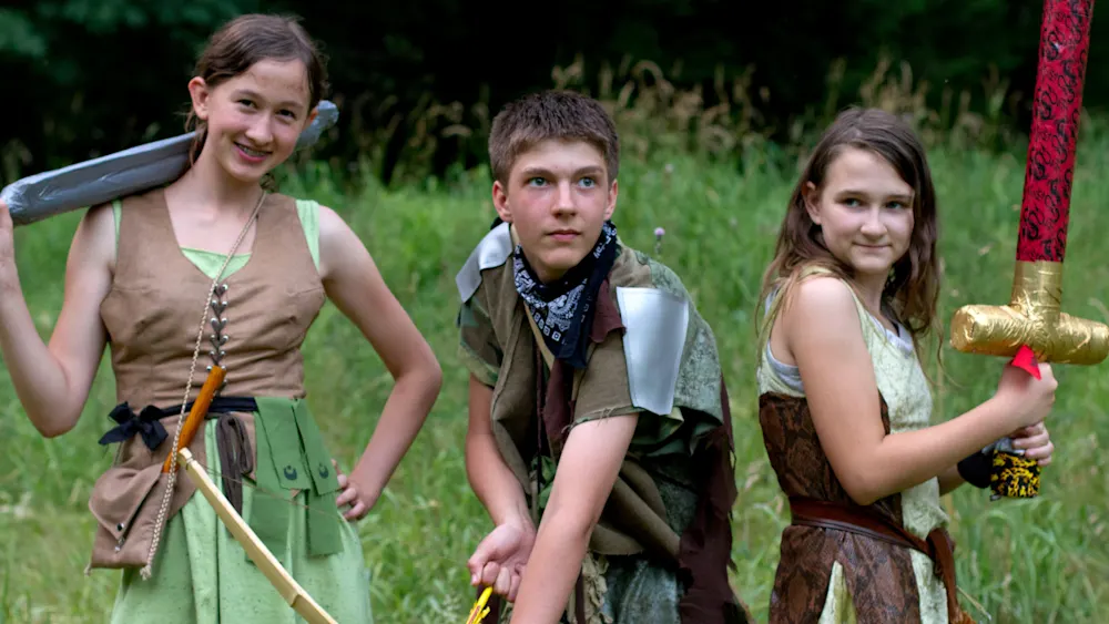Realms role-playing campers in costume adventure