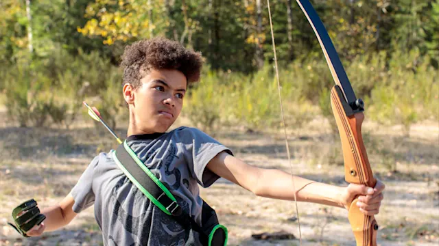 Campers at the archery range on a no-school day