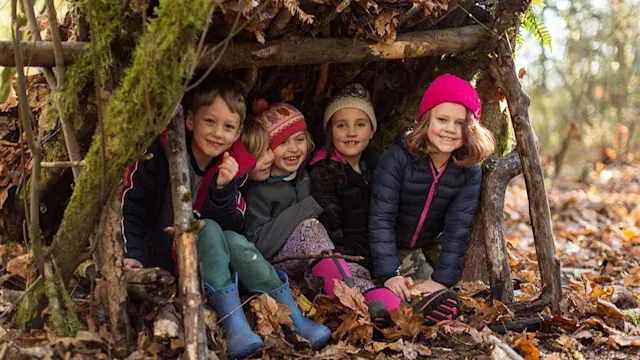 Campers exploring the winter forest